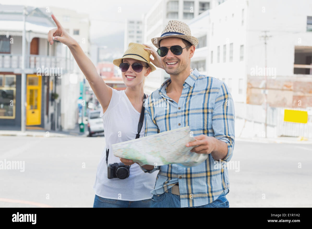 Woman tourist pointing camera hi-res stock photography and images - Alamy
