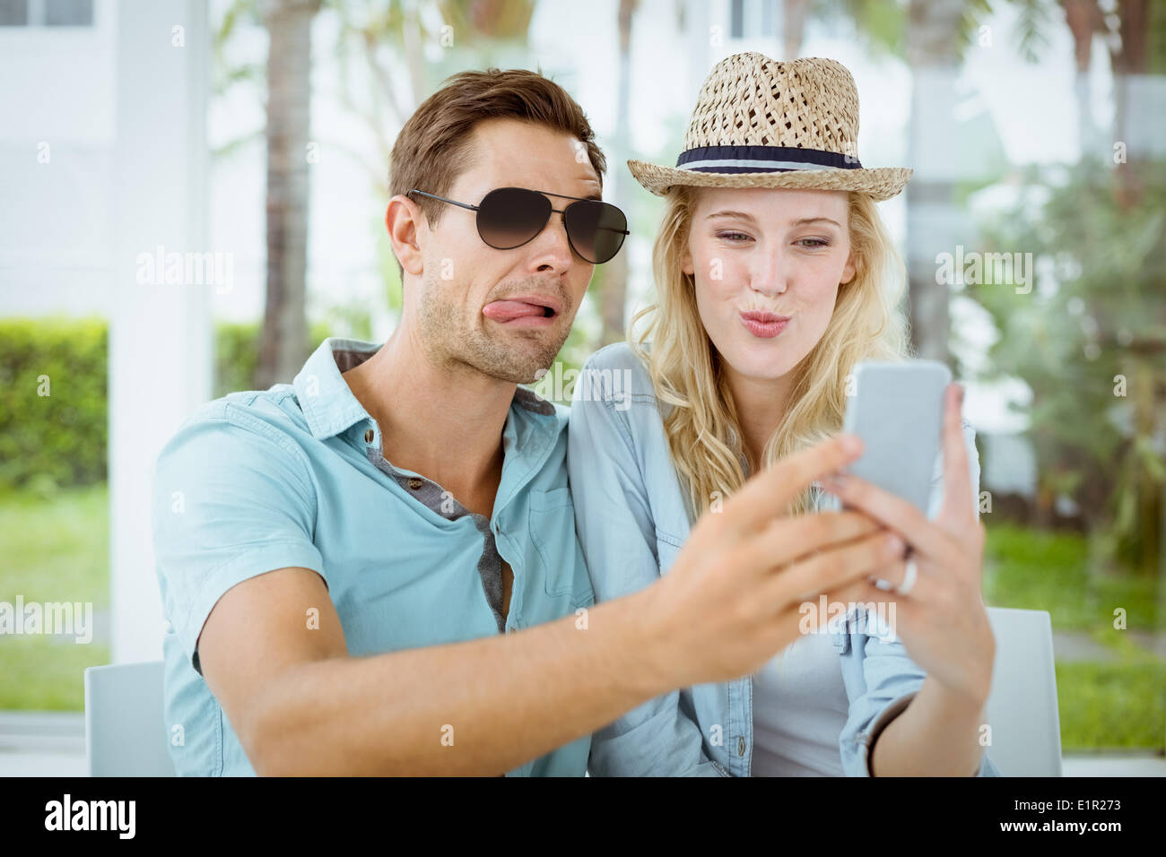 Hip young couple taking a selfie together Stock Photo