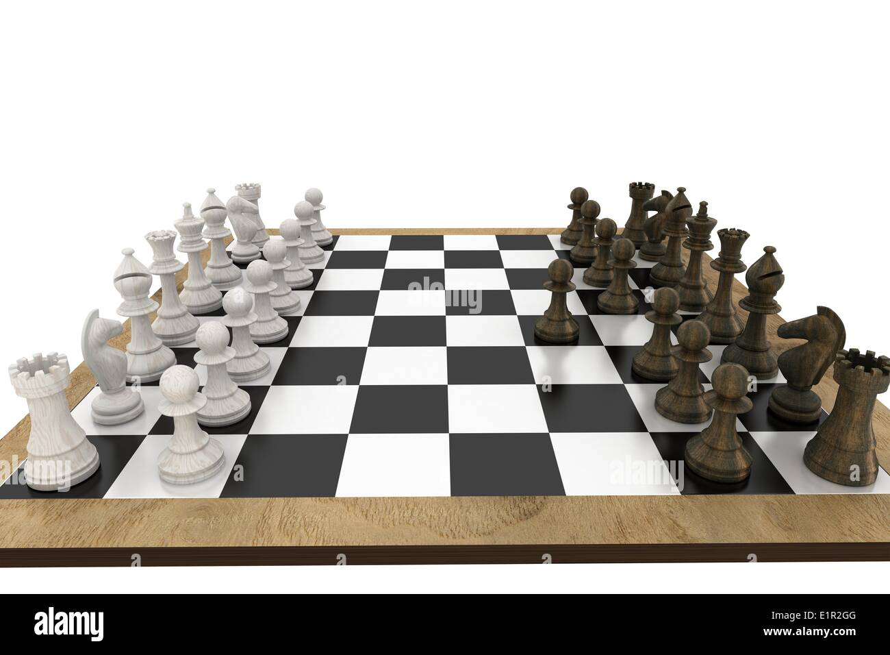 Chess pieces facing off on board Stock Photo
