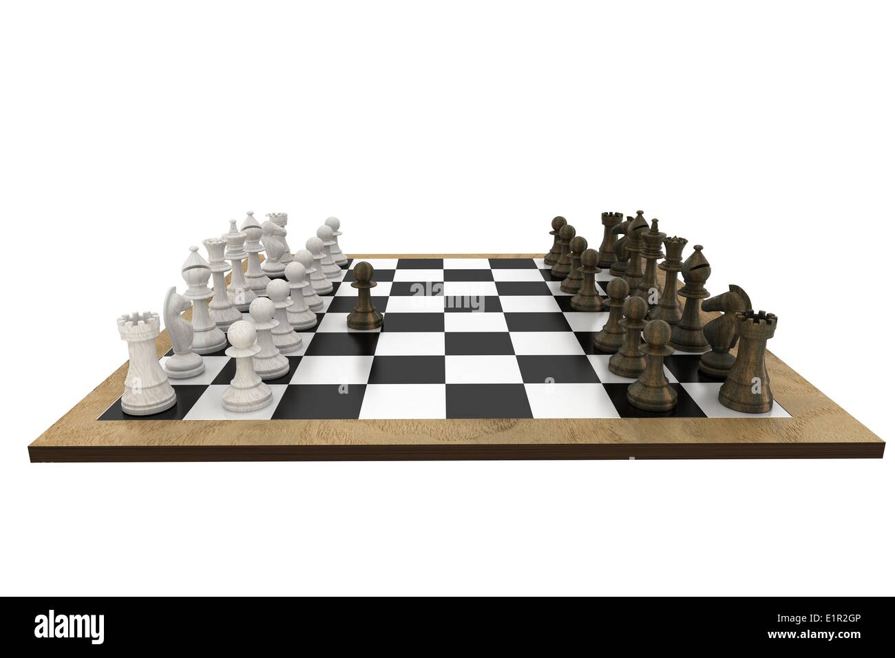 Chess pieces facing off on board Stock Photo