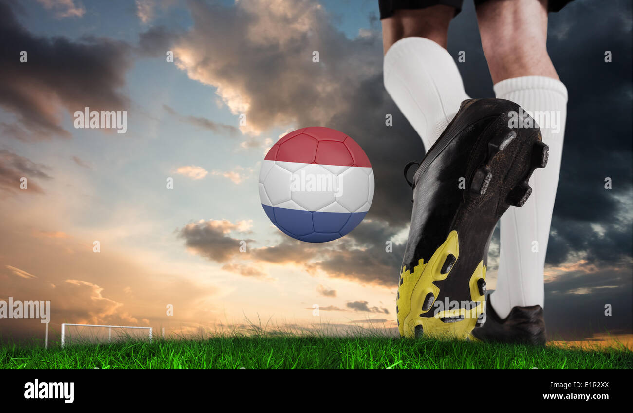 Composite image of football boot kicking dutch ball Stock Photo Alamy