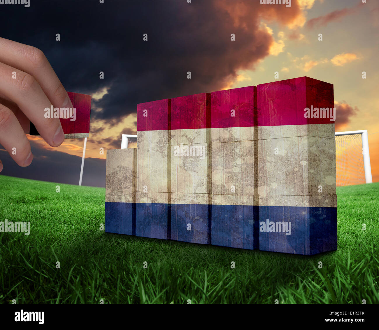 Hand building grass clouds hi-res stock photography and images - Alamy