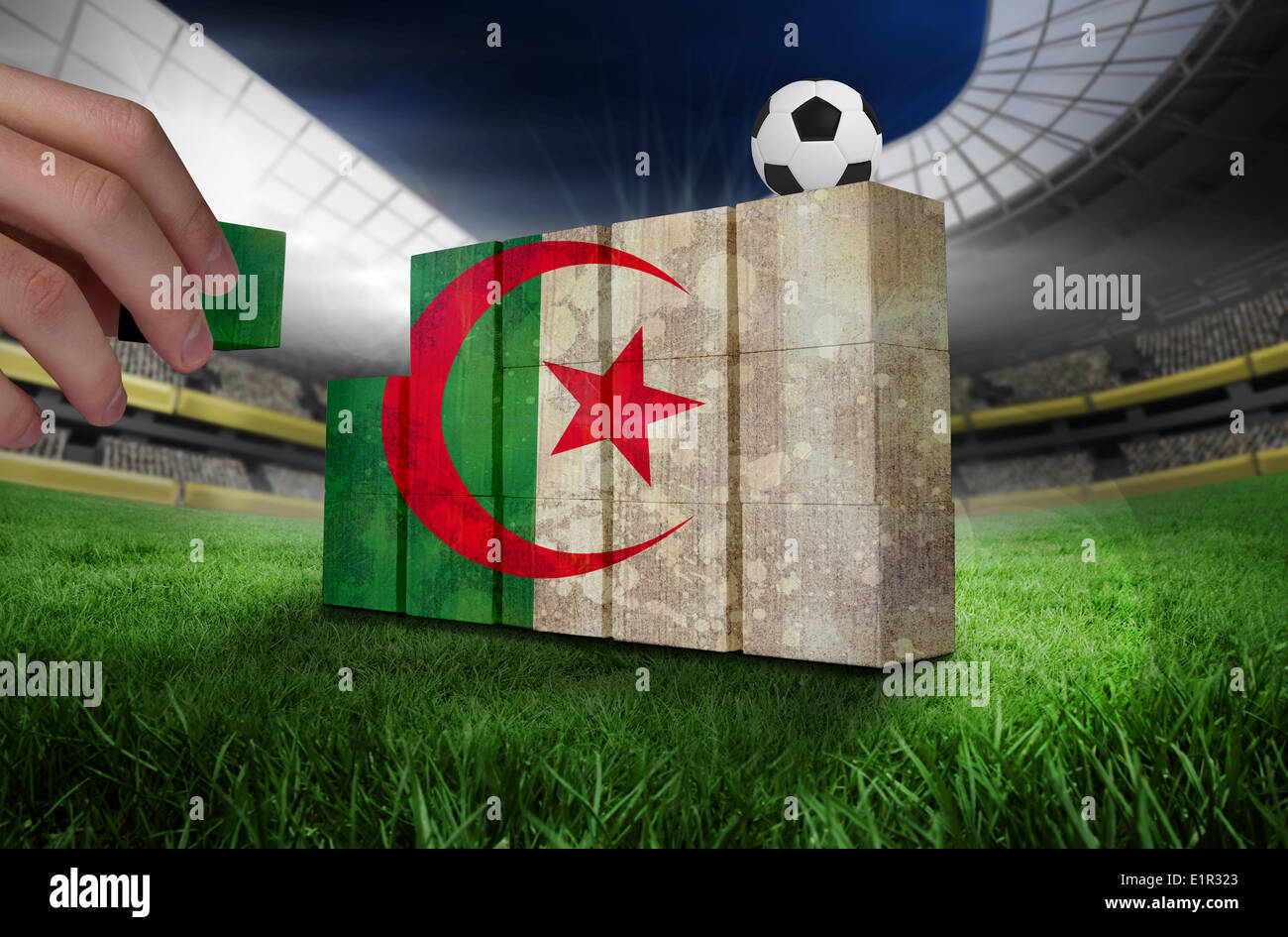 Composite image of hand building wall Stock Photo