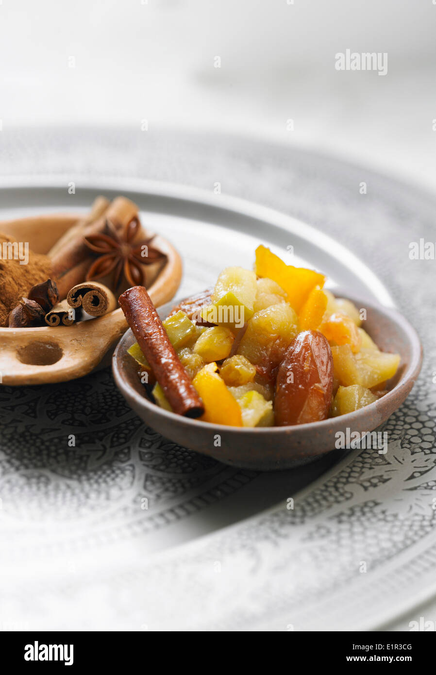 Spicy stewed dates and apples Stock Photo