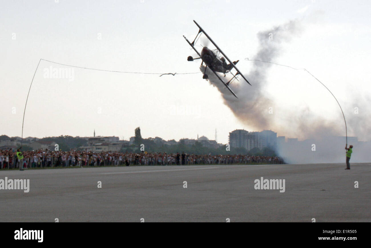 Istanbul, Turkey. 9th June, 2014. An aircraft is seen performing during an aerobatic flight show in Bursa, Turkey, on June 9, 2014. Credit:  Xinhua/Alamy Live News Stock Photo