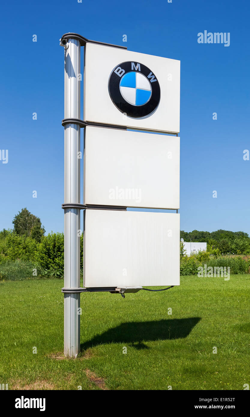 BMW dealership sign against blue sky Stock Photo