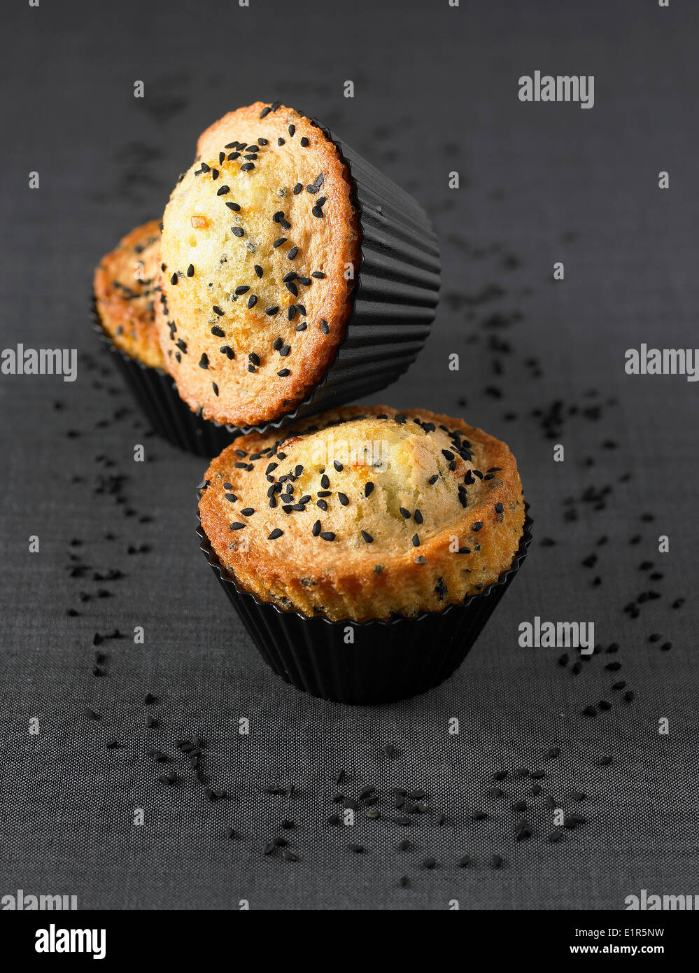 Black sesame seed and candied orange muffins Stock Photo Alamy