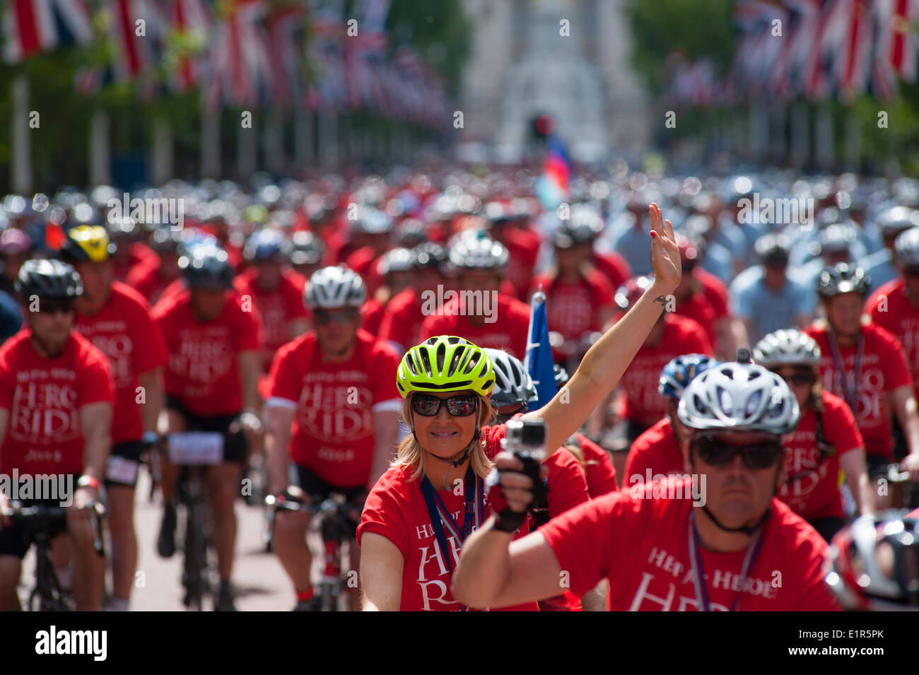 Colourful Hero Ride 2014 riders in The Mall, central London Stock Photo ...