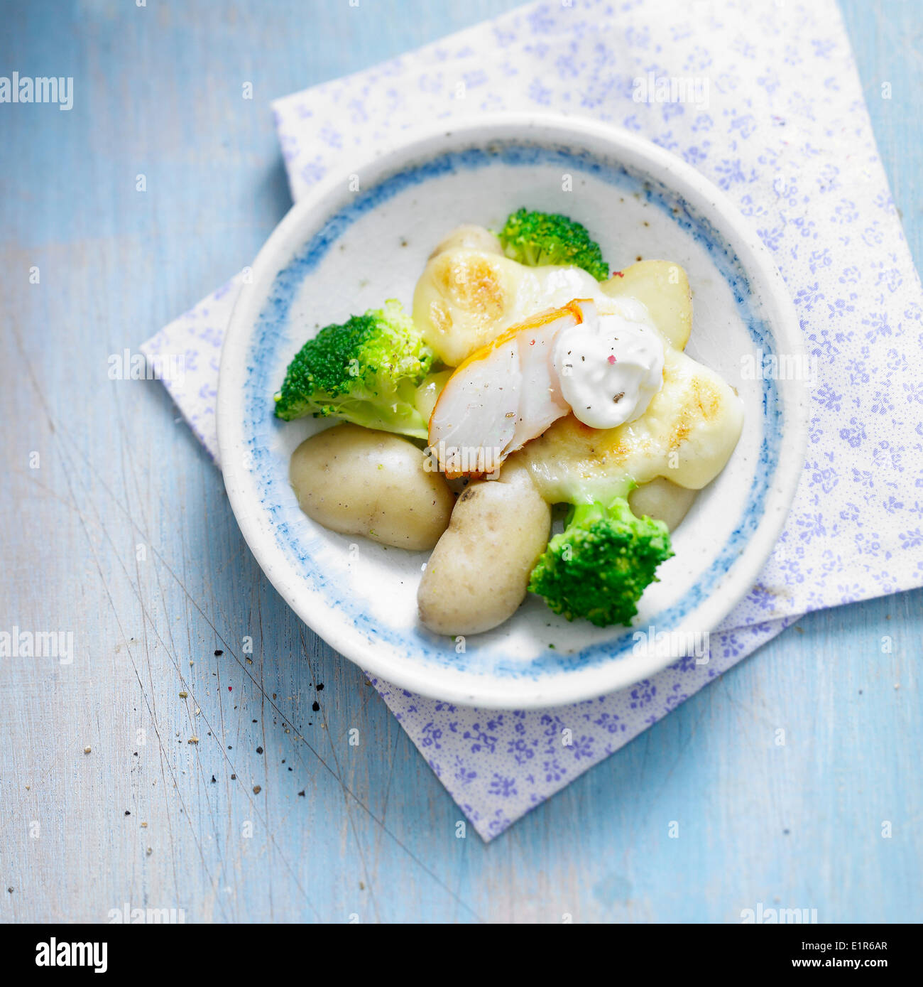 Raclette with haddock,broccolis and potatoes Stock Photo