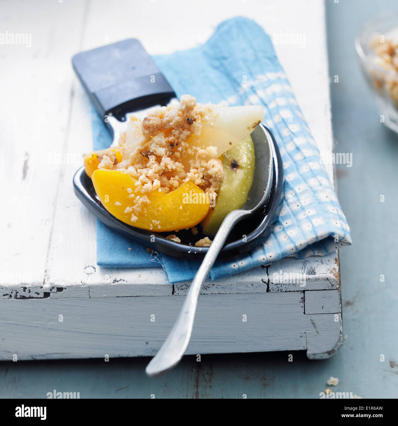 Fruit crumble-style Raclette Stock Photo