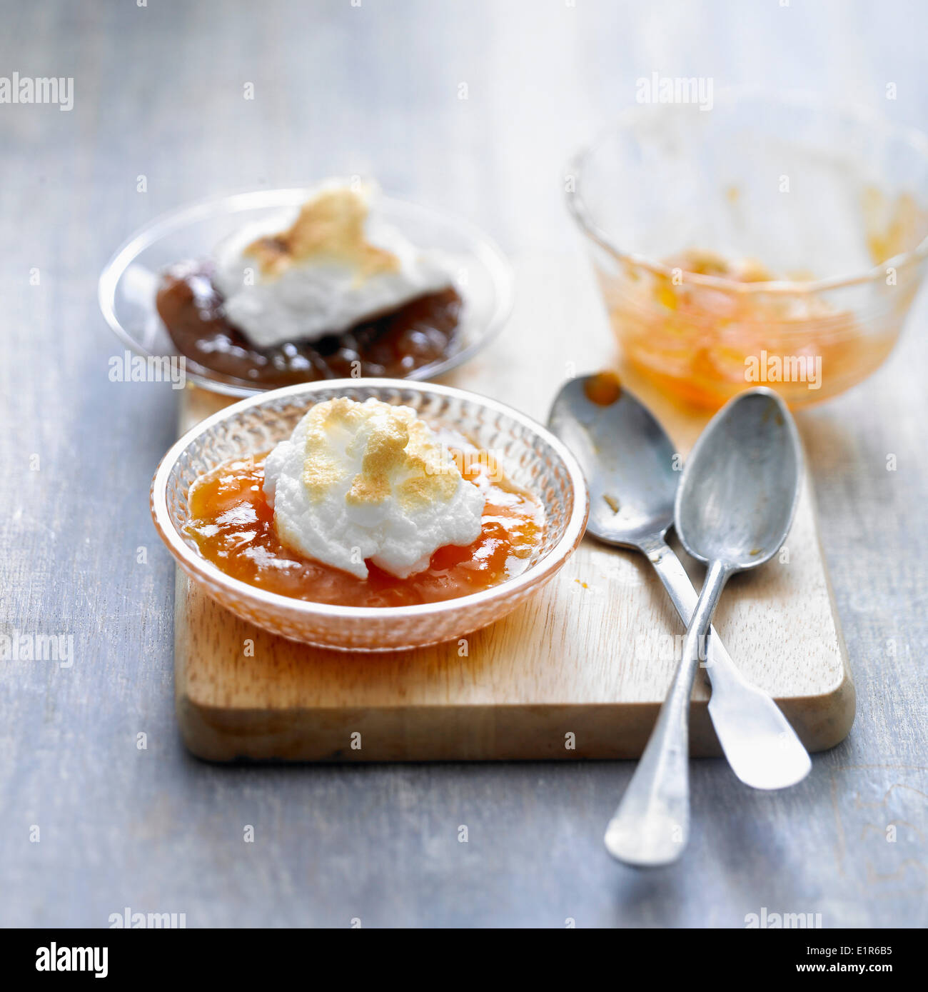 Stewed fruit with meringue topping Stock Photo