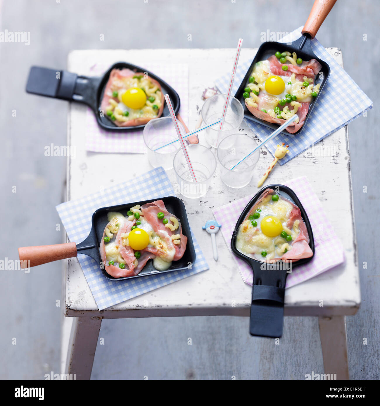 Kid's Raclette with shell pasta and ham Stock Photo