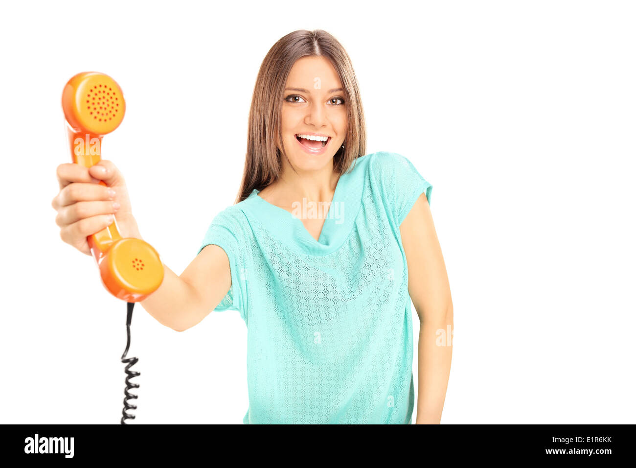 Beautiful young woman holding a telephone Stock Photo
