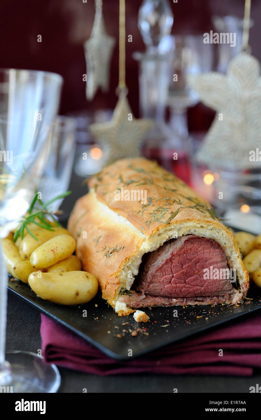 Beef Wellington with herbs and Ratte potatoes Stock Photo