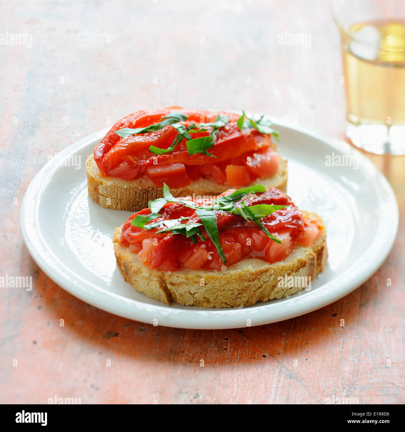 Marinated pepper and tomato bruschettas Stock Photo