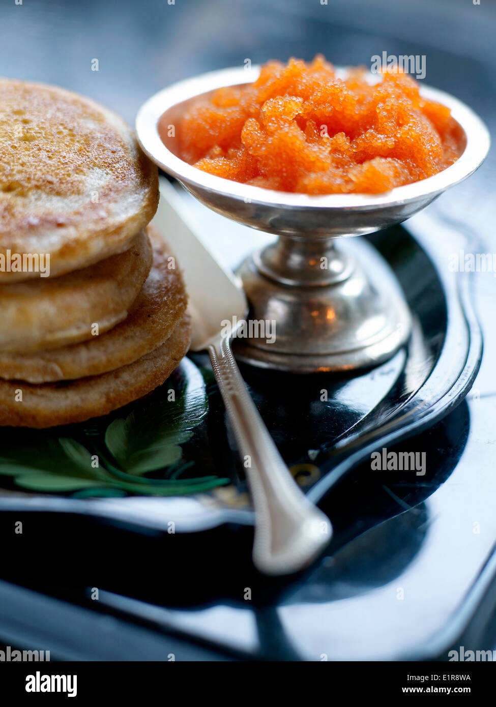 Blinis with fish roe Stock Photo - Alamy