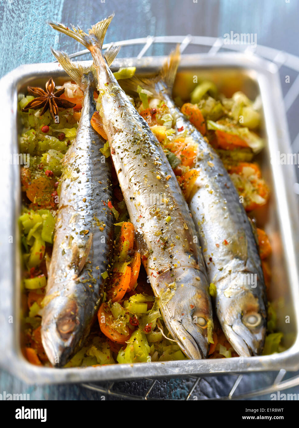 Mackerel with aniseedflavored young vegetables Stock Photo Alamy