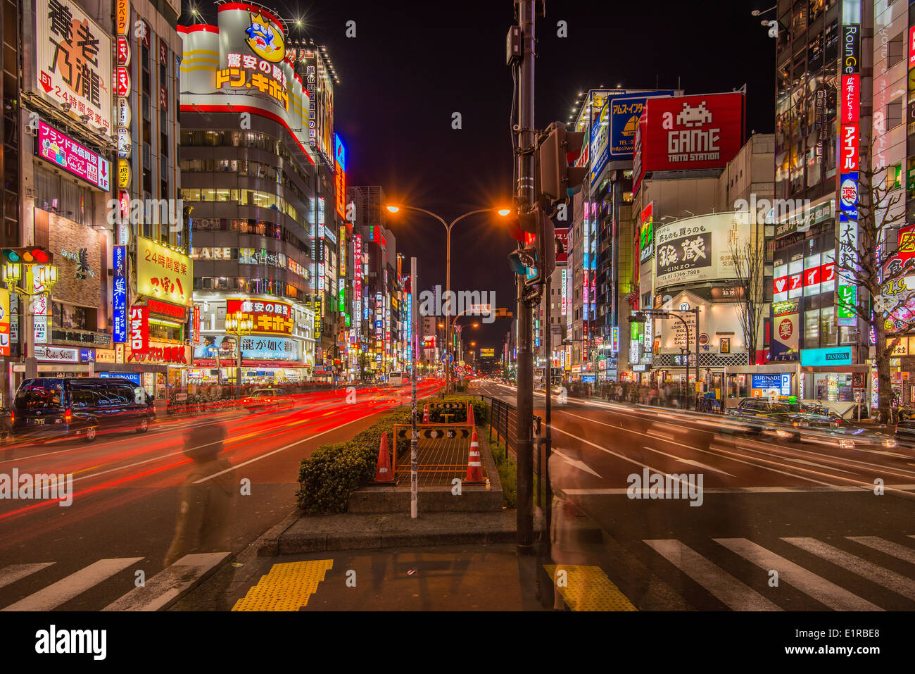 Night view of Yasukuni-dori street, Shinjuku district, Tokyo, Japan Stock Photo