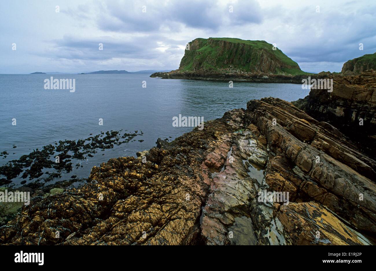 The isle Garbh Eileach in the Firth of Lorne at the west coast of Scotland Stock Photo