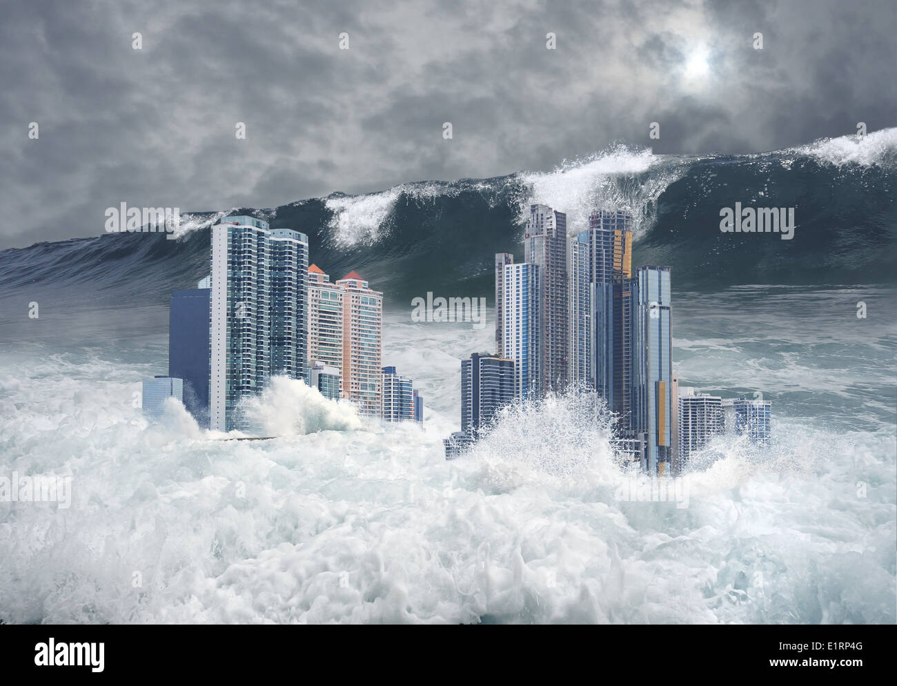 Apocalyptic scene of modern city's skyscrapers submerged by tsunami with a giant second wave coming Stock Photo