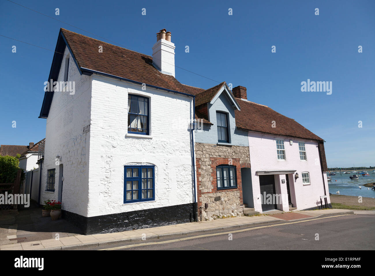 Old white painted terrace house by the harbour in Emsworth. Stock Photo