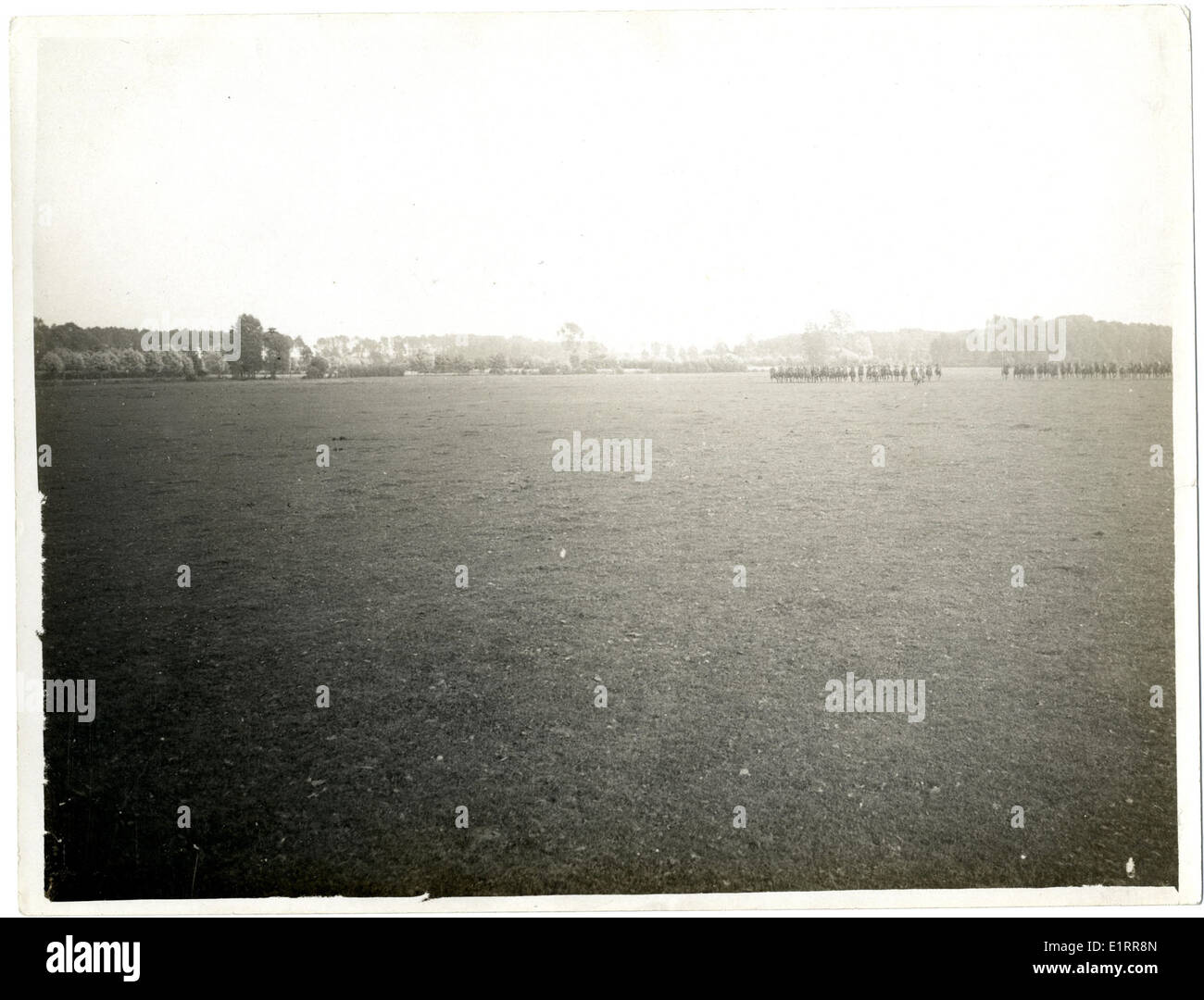 A cavalry squadron from various Indian regiments, including the 15th Sikhs, 18th Lancers, 2/2 Gurkhas, and 39th Garhwalis, is seen charging near St Floris, France. These regiments were recognized for their valor in World War I and received honors or were mentioned in dispatches. The image captures the intense action of the cavalry in battle during the war. Stock Photo