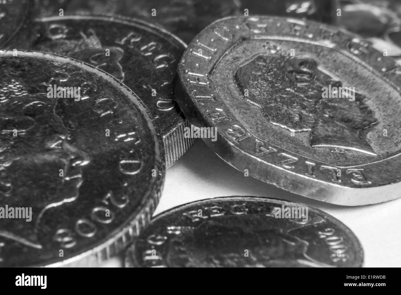 A black and white macro of coins Stock Photo