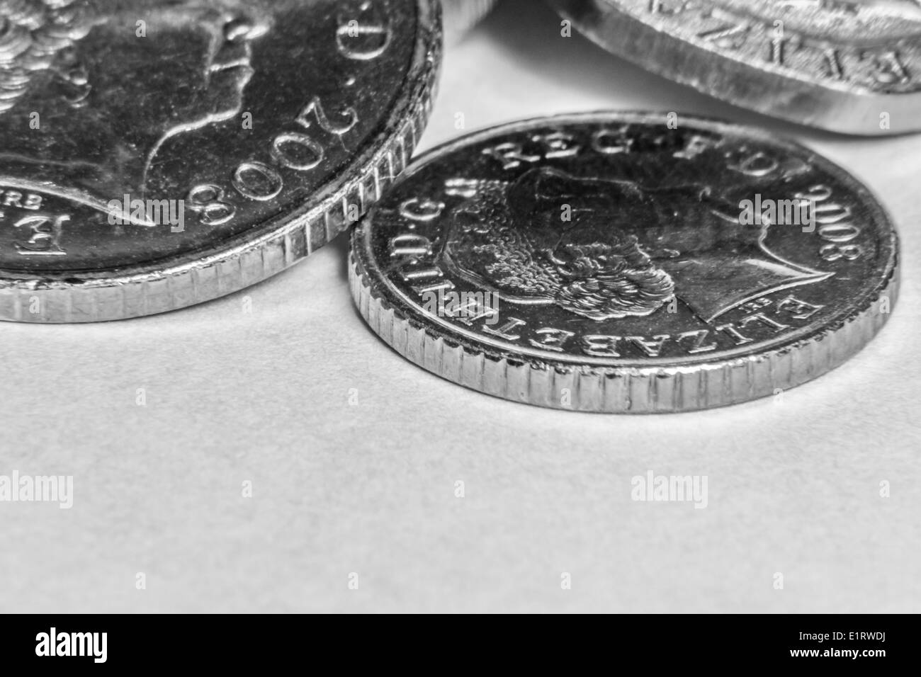 A black and white macro of coins Stock Photo