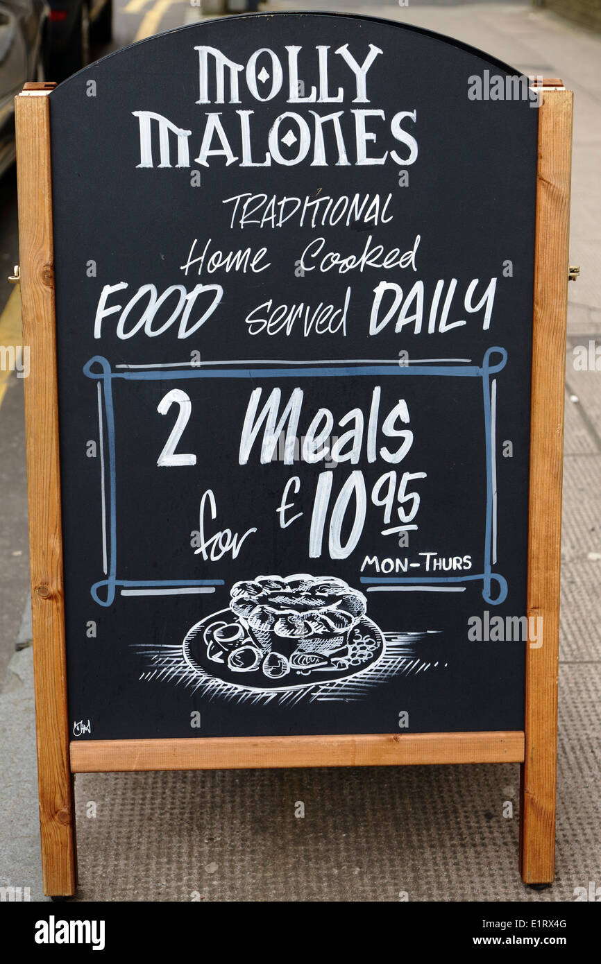 A board advertising meals at Molly Malones pub in Glasgow city centre, Scotland, UK Stock Photo