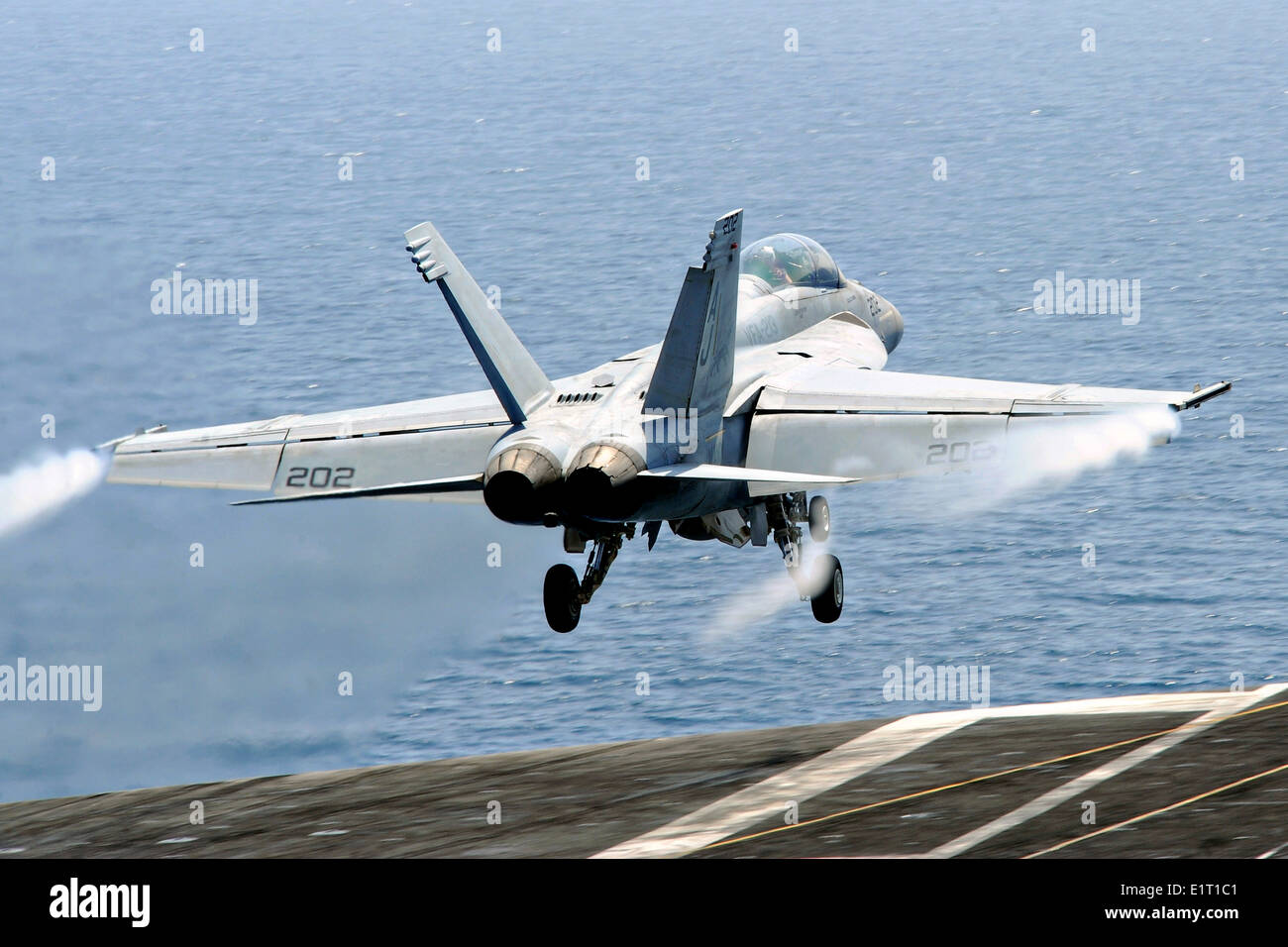 A US Navy F/A-18F Super Hornet fighter aircraft launches position from the flight deck of aircraft carrier USS George H.W. Bush June 7, 2014 in the Arabian Sea. Stock Photo