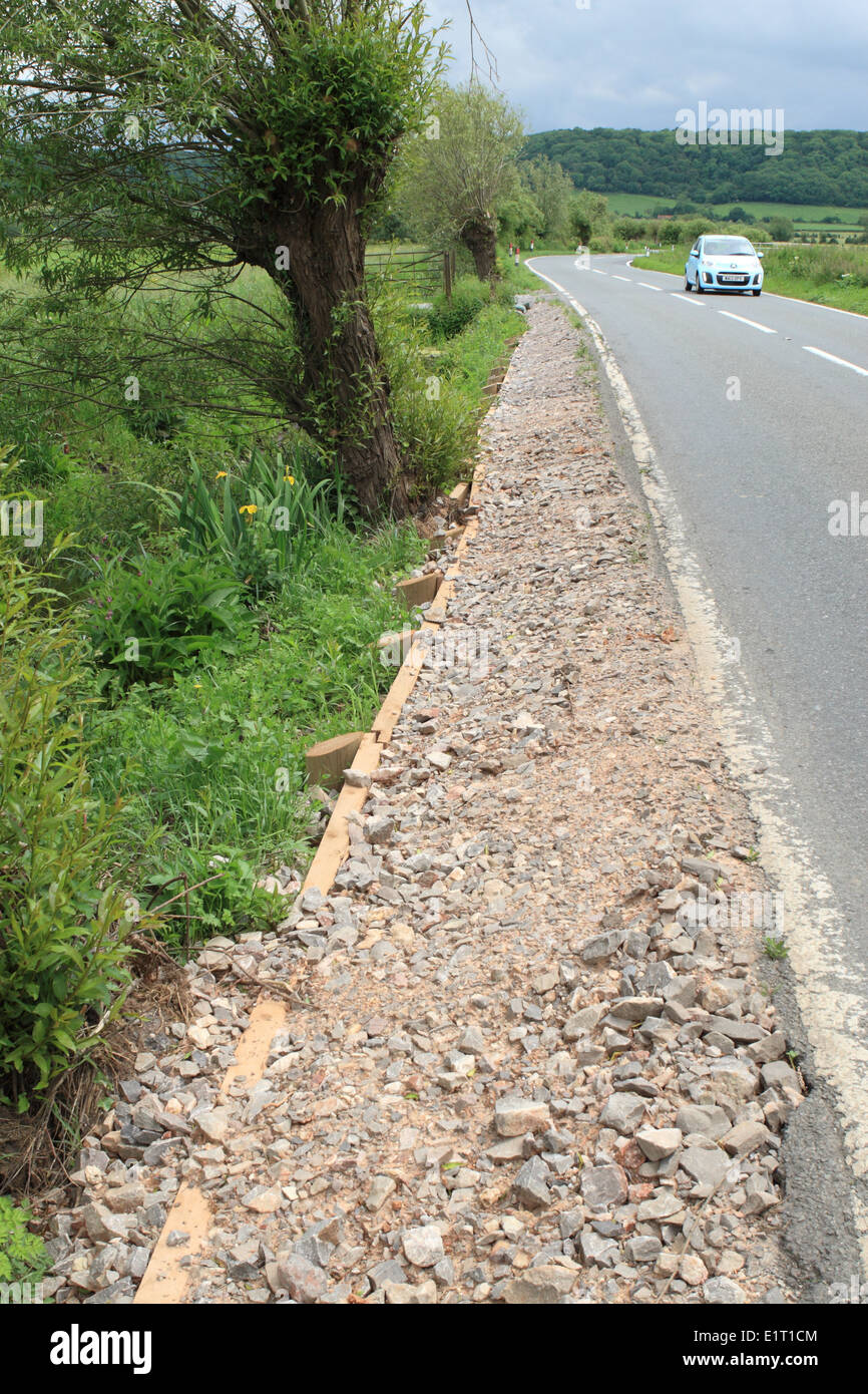 Somerset Levels roadside repairs to the flood damaged edge of the A372  mainroad near Othery June 2014 Stock Photo