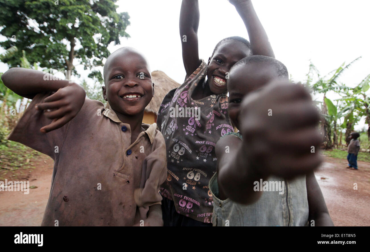 Village children play and pose for pictures in the Nakasongola region of Uganda Stock Photo