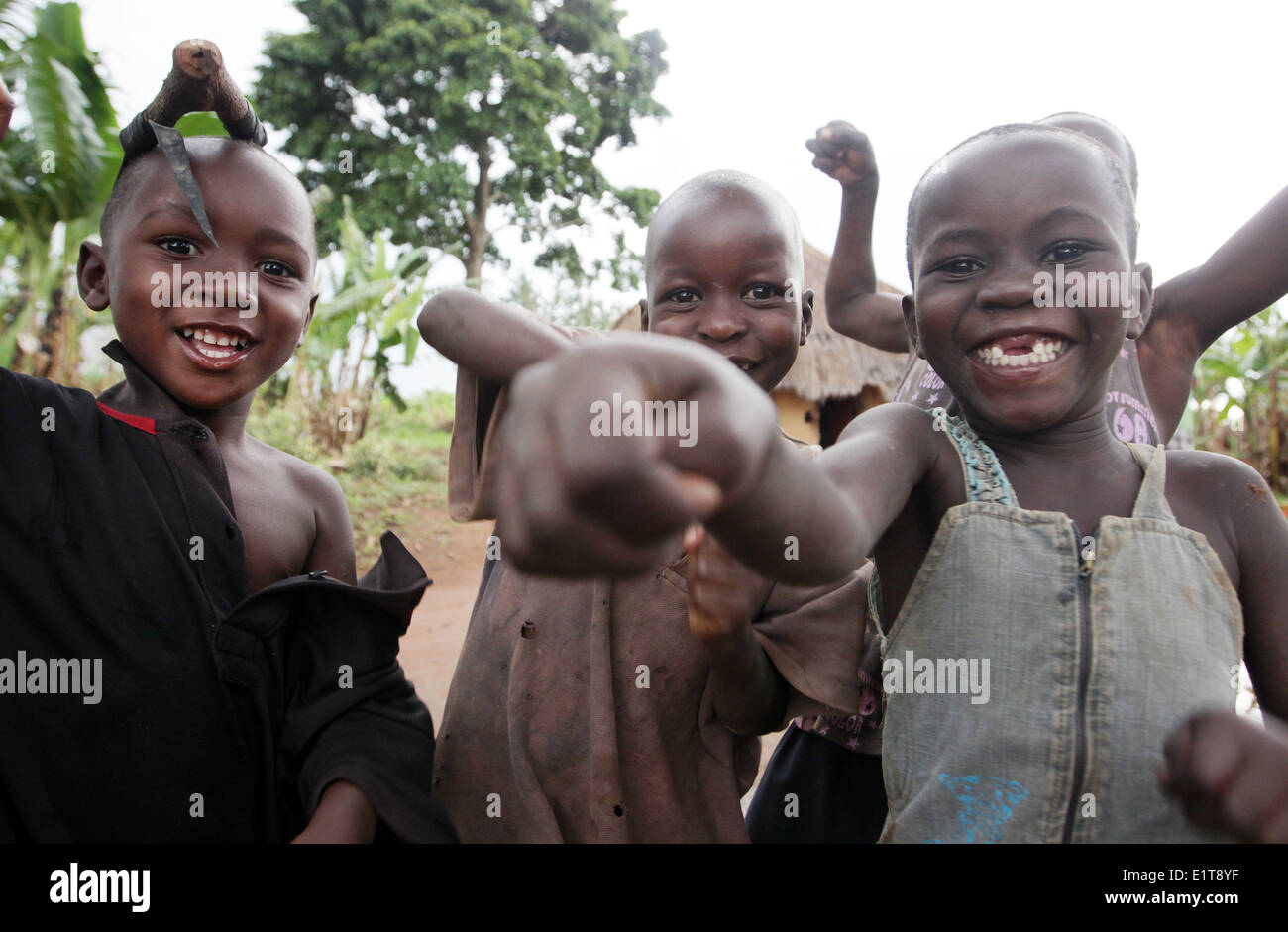 Village children play and pose for pictures in the Nakasongola region of Uganda Stock Photo