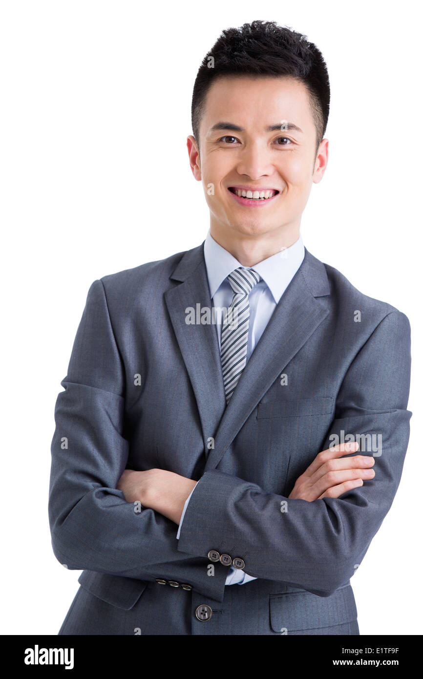 Happy businessman with arms crossed Stock Photo - Alamy
