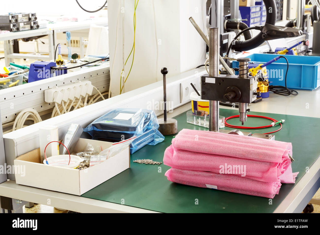 photo of electronics equipment assembly workplace with necessary tools Stock Photo