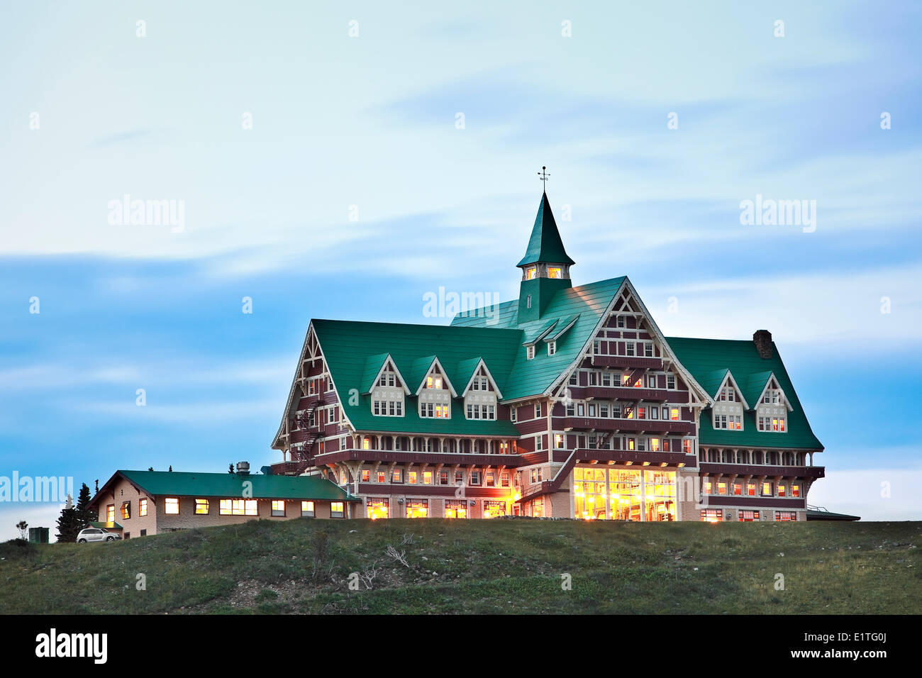 Prince of Wales Hotel at dusk, Waterton Lakes National Park, Alberta, Canada Stock Photo