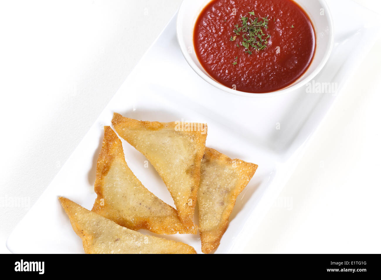 Wontons with Marinara Sauce, Appetizer Stock Photo