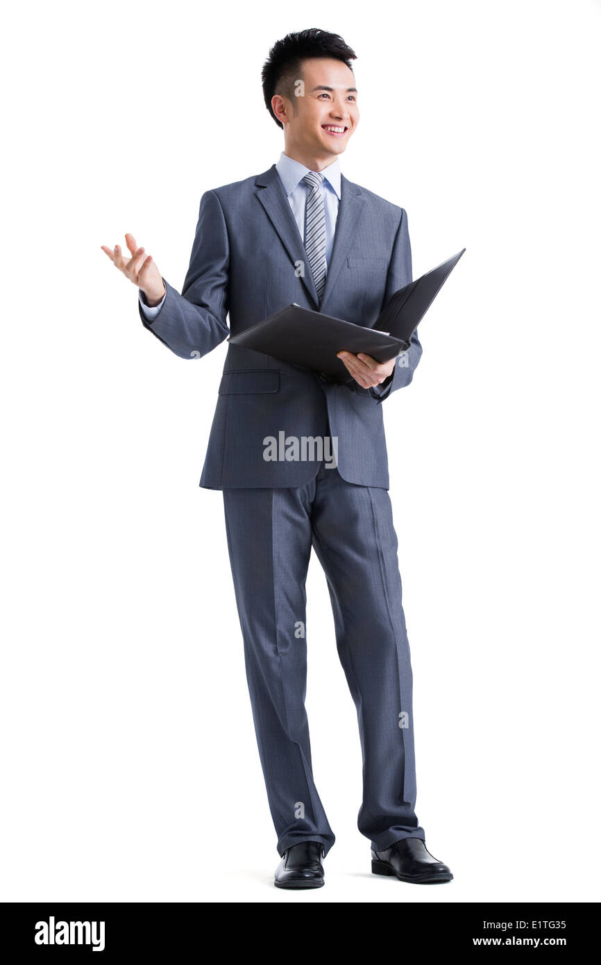 Young businessman giving a speech Stock Photo
