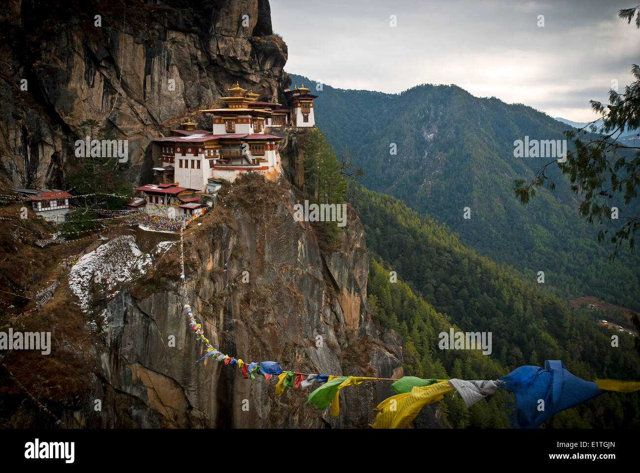 Taktsang (Tigers Nest) Monastery looms above Paro, Bhutan Stock Photo