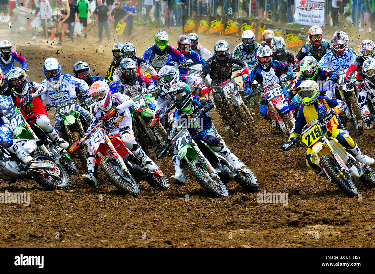 Motocross action at the start of the race during the Monster Energy Motocross Nationals at the Wastelands Track in Nanaimo, BC. Stock Photo