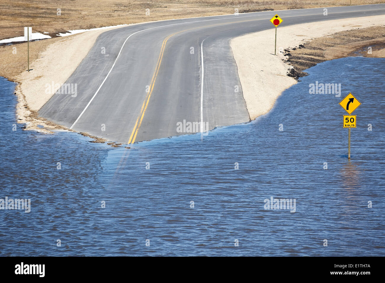 Flooding of the Red River on Highway 44, Red River Valley, north of Winnipeg, Manitoba, Canada Stock Photo