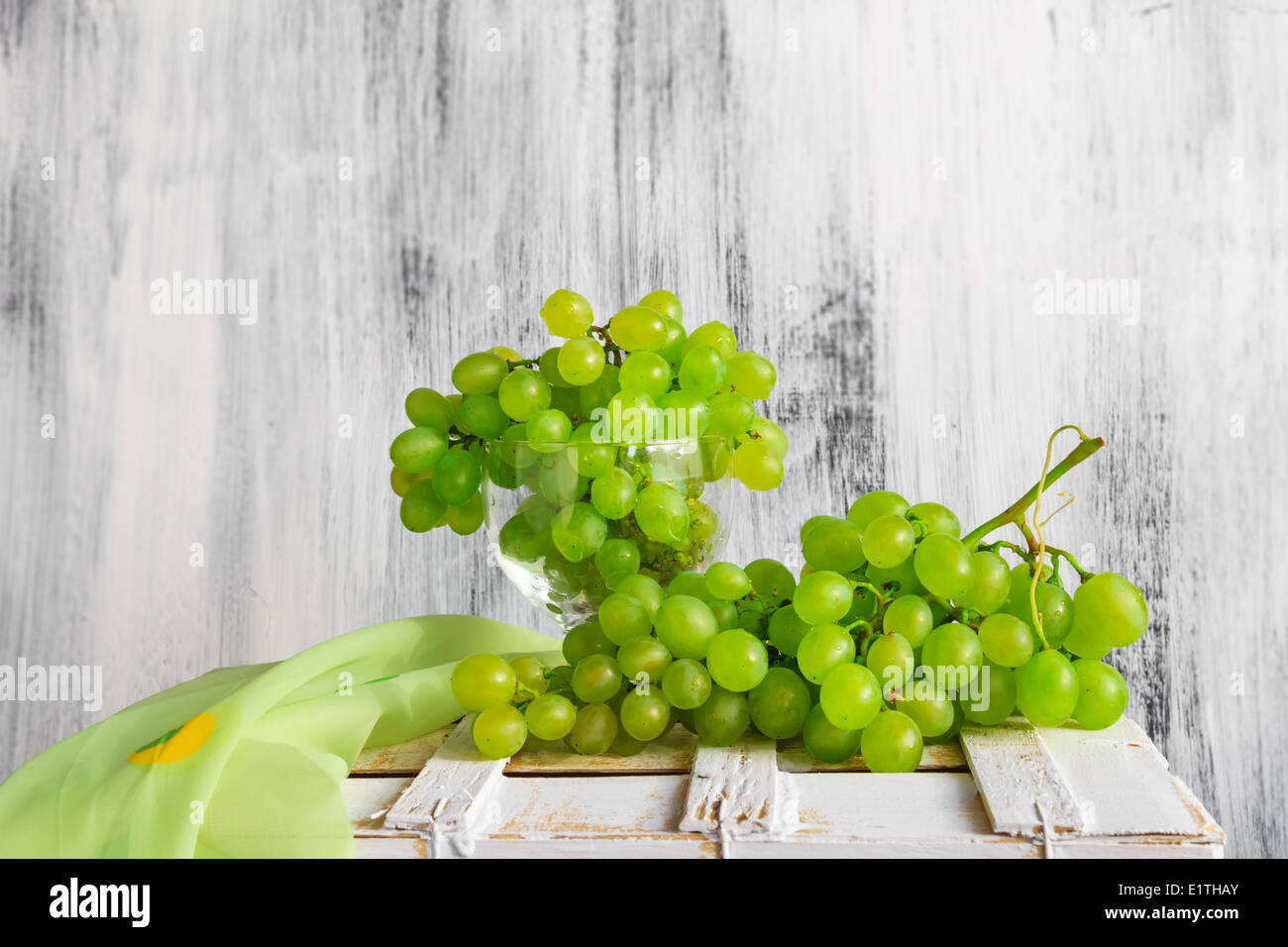 Still life with fruit and a bottle of wine grapes Stock Photo - Alamy