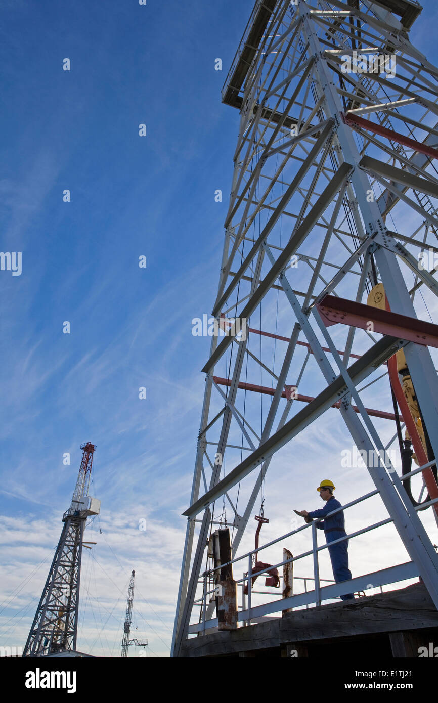 Oil rig worker on drilling platform. Stock Photo