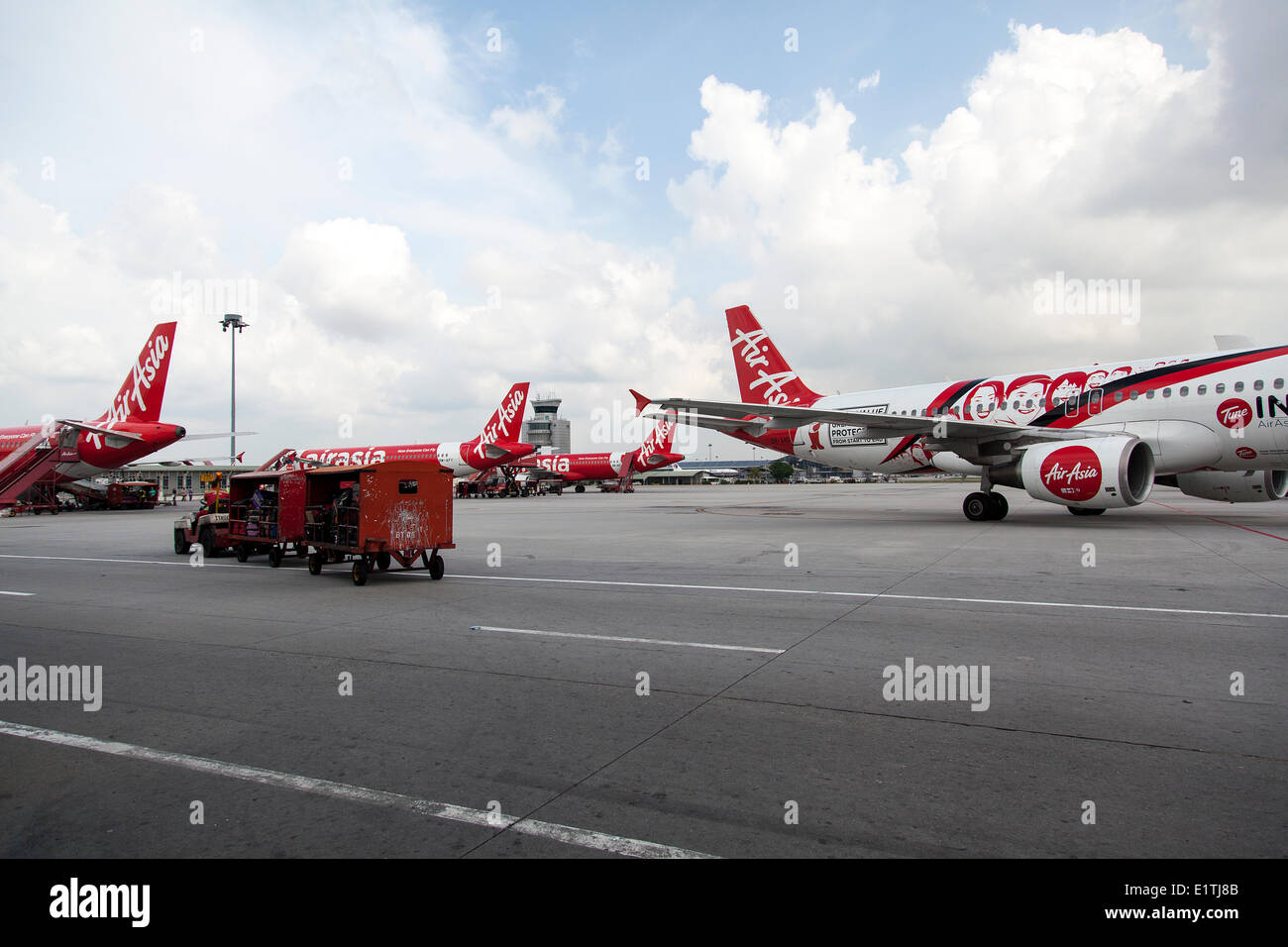 Air Asia planes at Kuala Lumpur International Airport LCCT, Malaysia, April 30, 2014. Air Asia is a Malaysian low-cost airline operating across the whole Asia. (CTK Photo/Karel Picha) Stock Photo