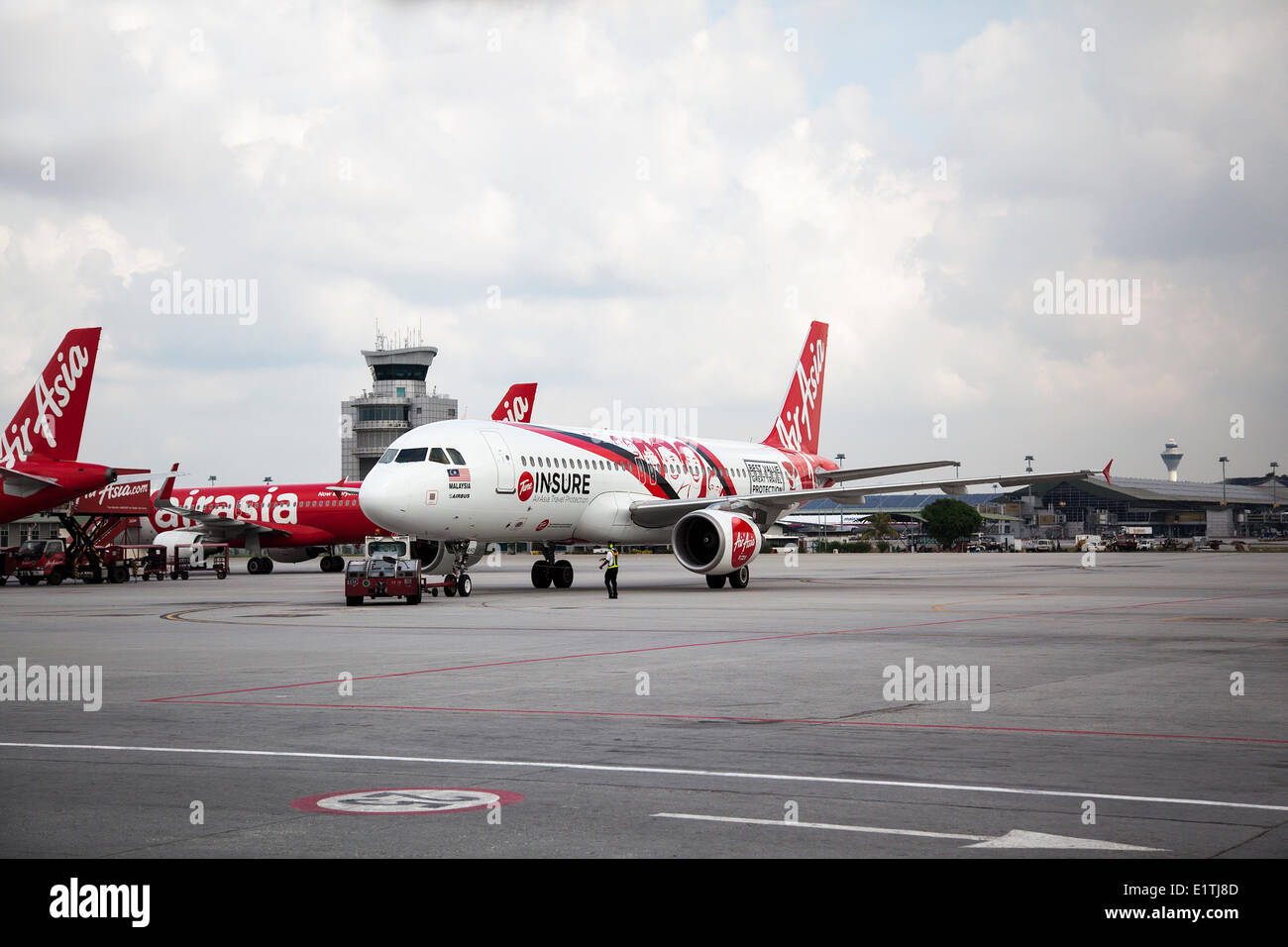 Air Asia planes at Kuala Lumpur International Airport LCCT, Malaysia, April 30, 2014. Air Asia is a Malaysian low-cost airline operating across the whole Asia. (CTK Photo/Karel Picha) Stock Photo