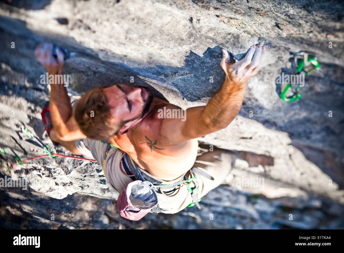A man sport climbing in the Canadian Rockies. Snake Eyes, 10c, Cougar Creek, Canmore, Alberta, Canada Stock Photo