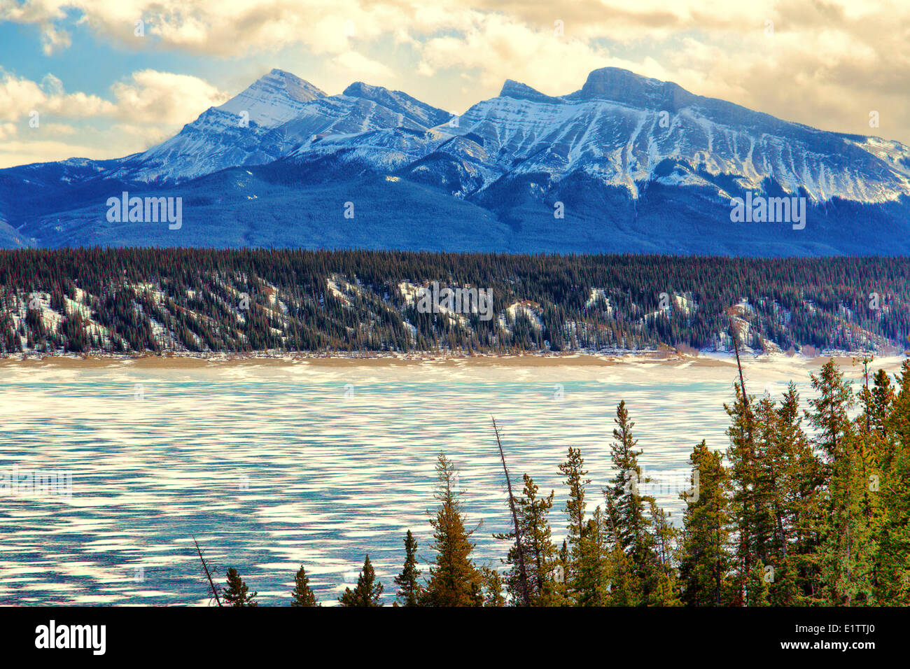 View of snow covered Mountains from Abraham Lake, Alberta, Canada Stock Photo