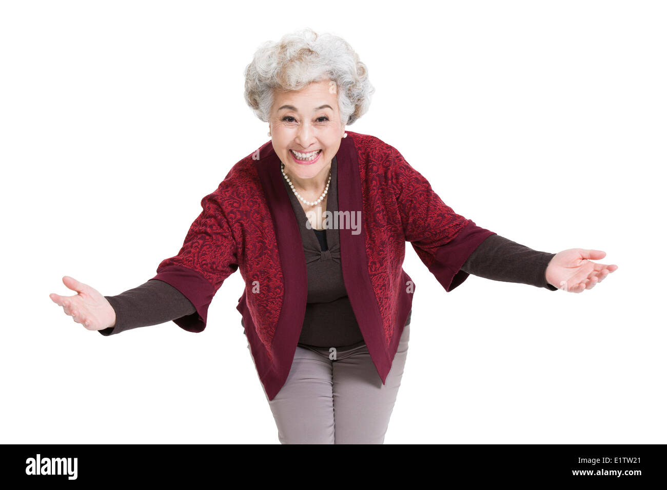 Senior woman arms outstretched hi-res stock photography and images - Alamy