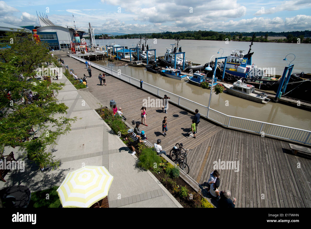 The boardwalk along the New Westminster Riverfront Quay. New Westminster, BC, Canada. Stock Photo