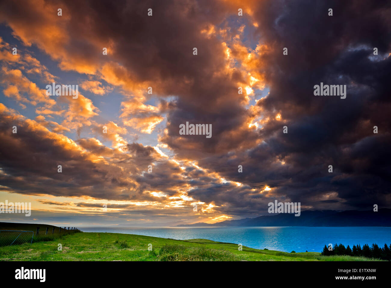 Sunset over South Bay and the Kaikoura Coast, East Coast, South Island, New Zealand. Stock Photo